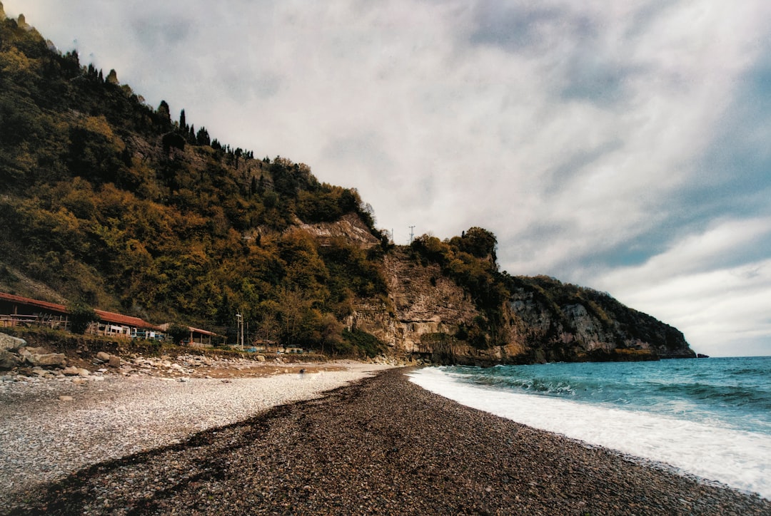 seashore under cloudy sky, Rocky Shore in cloudy day</p></figure><p>