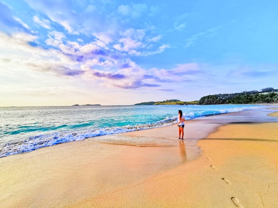 person on seashore during daytime in Calaguas Philippines