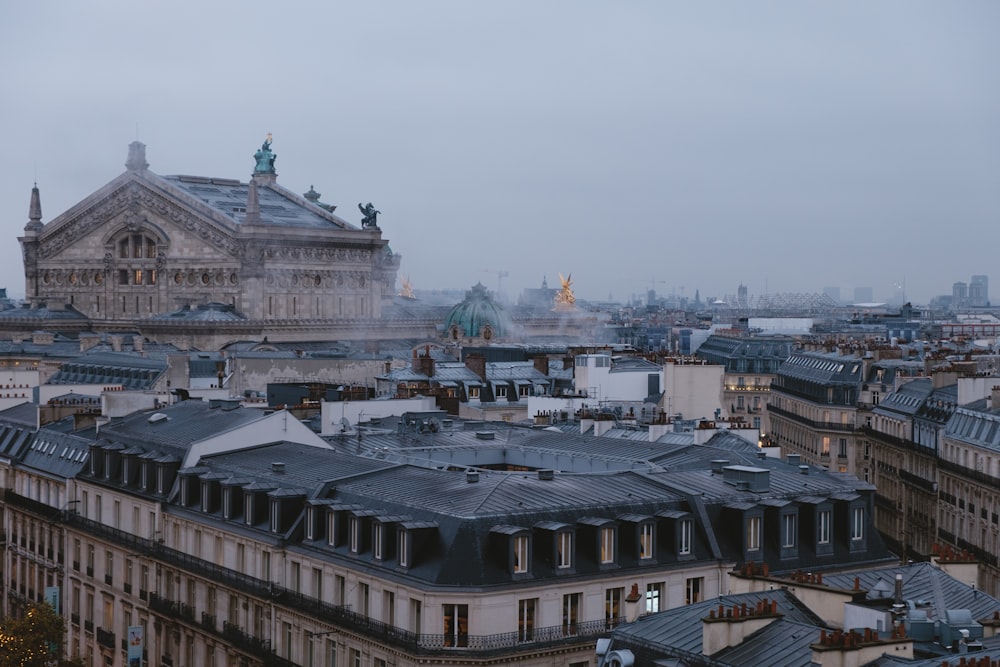 aerial photography of buildings under gray skies