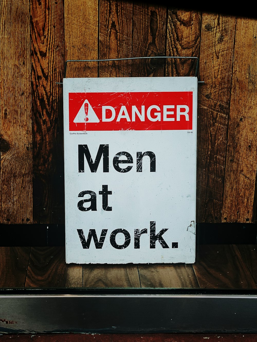 Danger men at work signboard