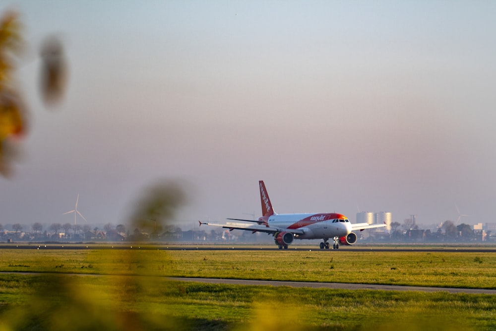 white airplane on runway