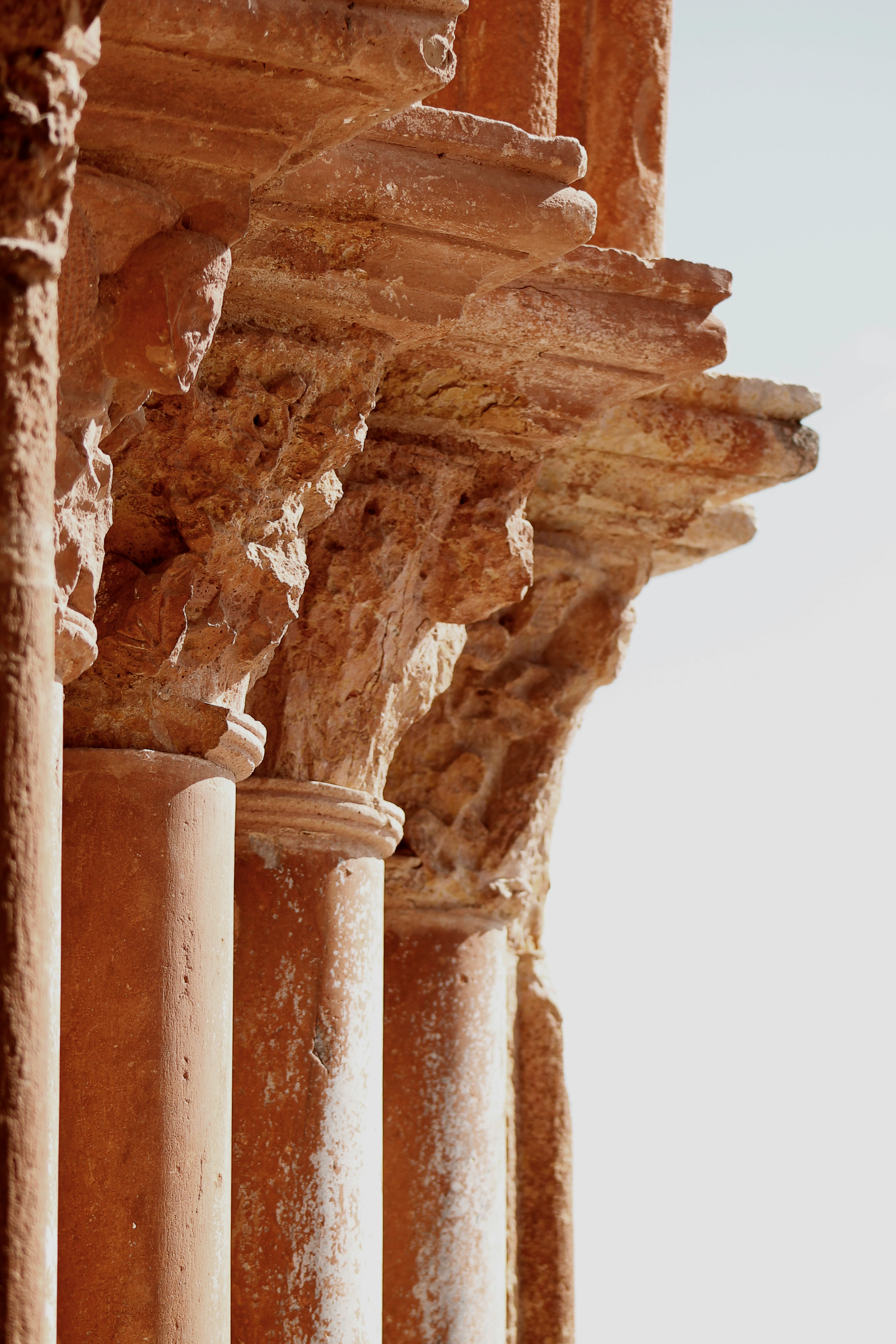 shallow focus photo of brown pillar posts