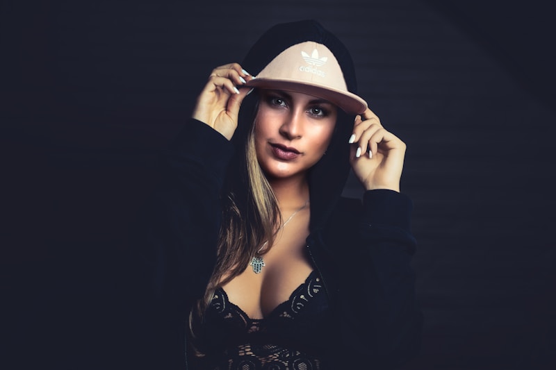 Trendy woman in black hoodie