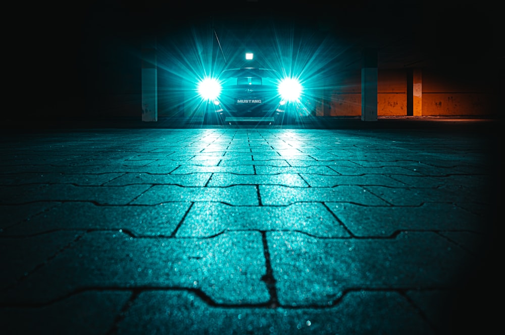 a car parked in a parking lot at night