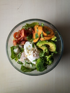 A vibrant salad bowl filled with various vegetables.