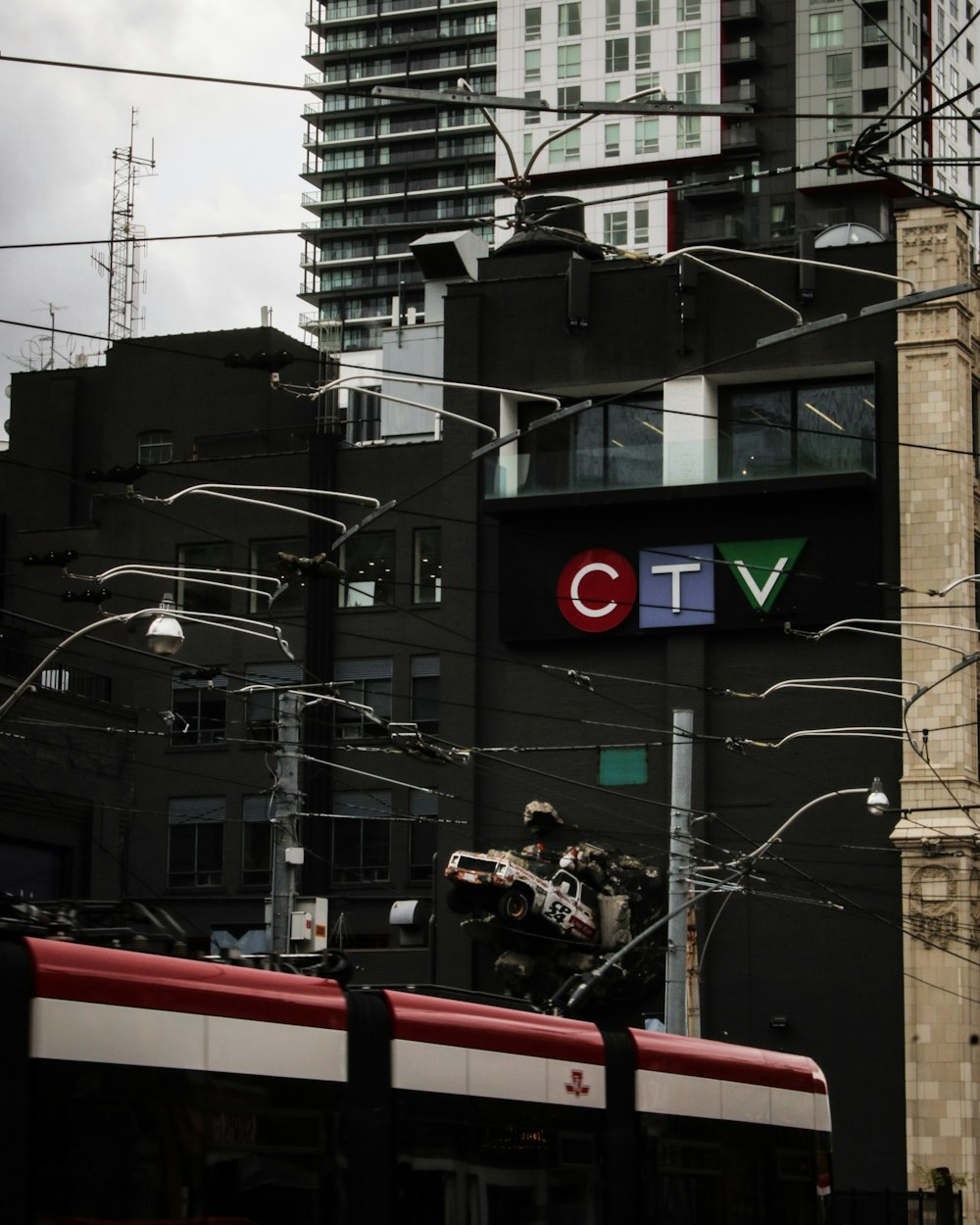 black CTV building near train