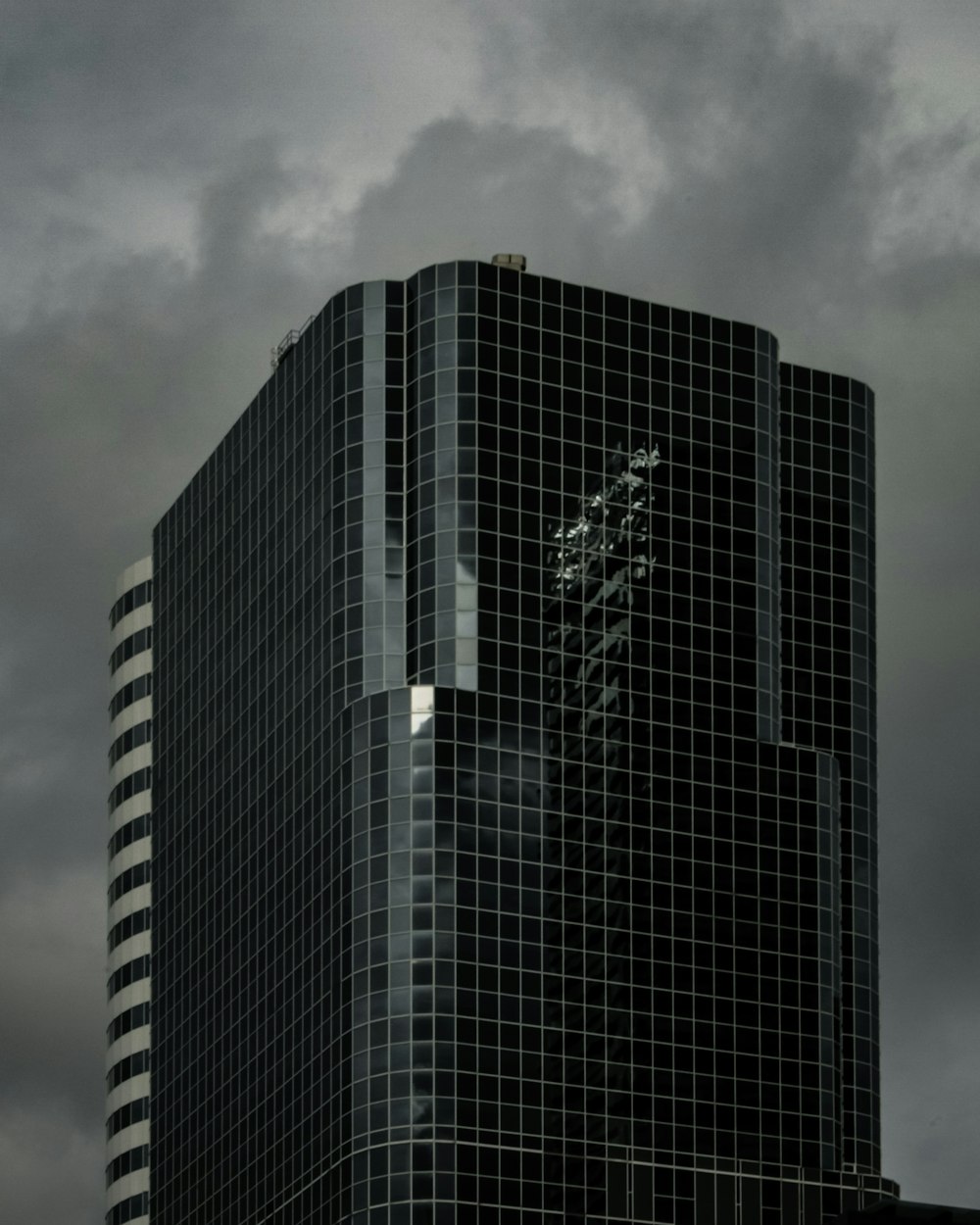 greyscale photography of curtain building