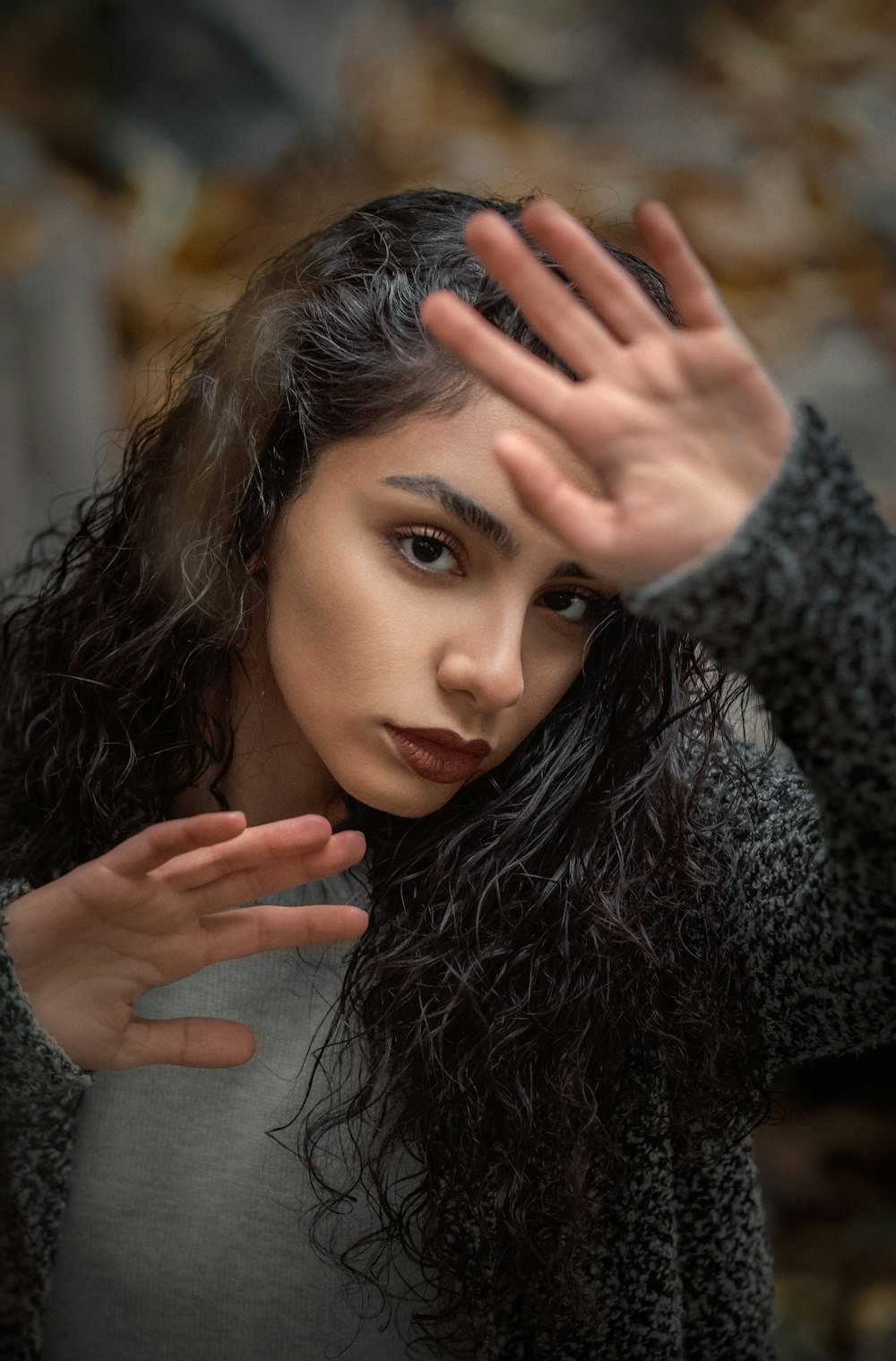 shallow focus photo of woman in black fur jacket