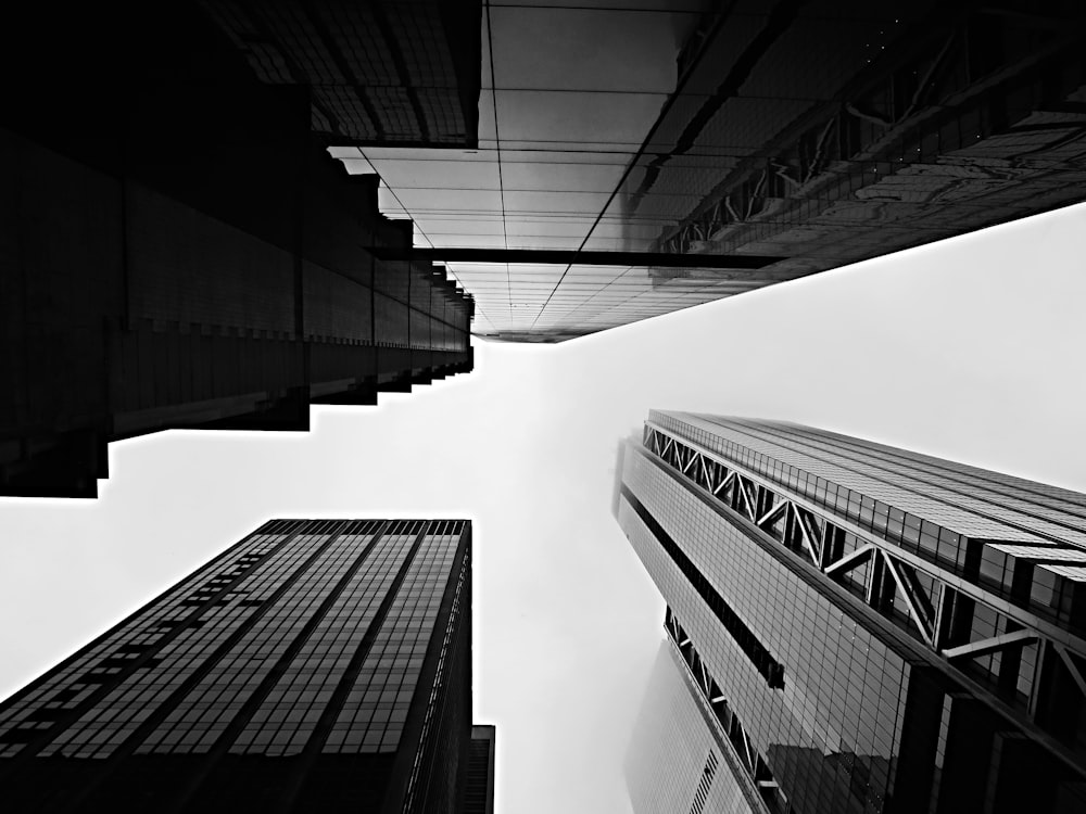 grayscale photography of high-rise buildings