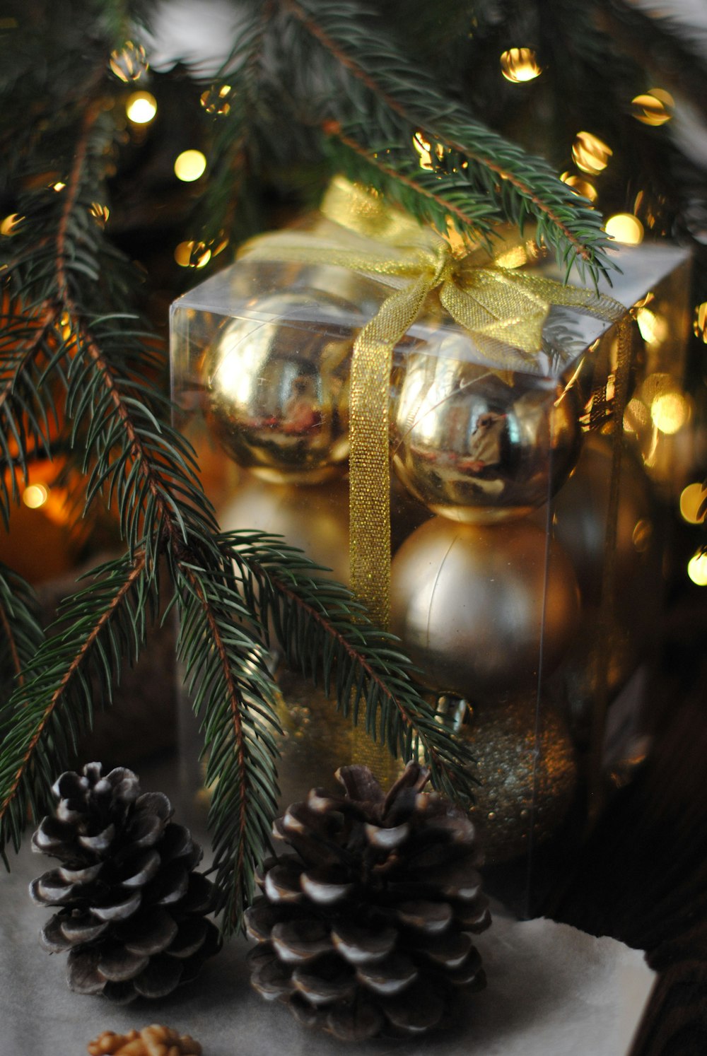 gray baubles beside Christmas tree