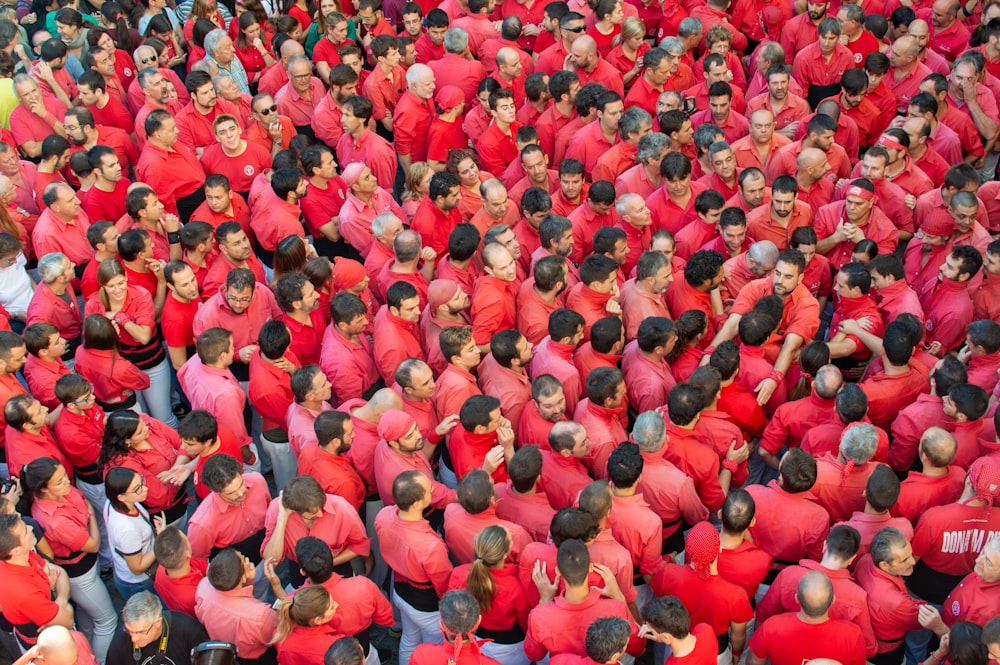 people wearing red shirts