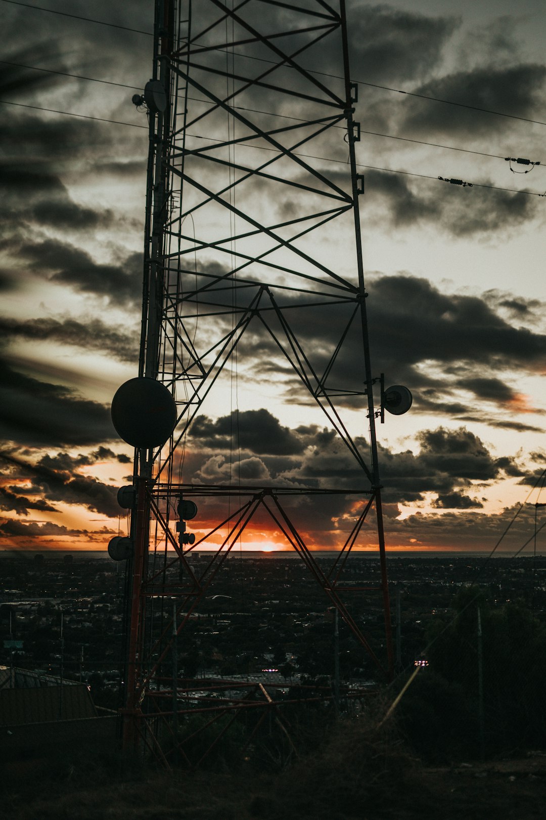 aerial photography of buildings under gray and orange sky