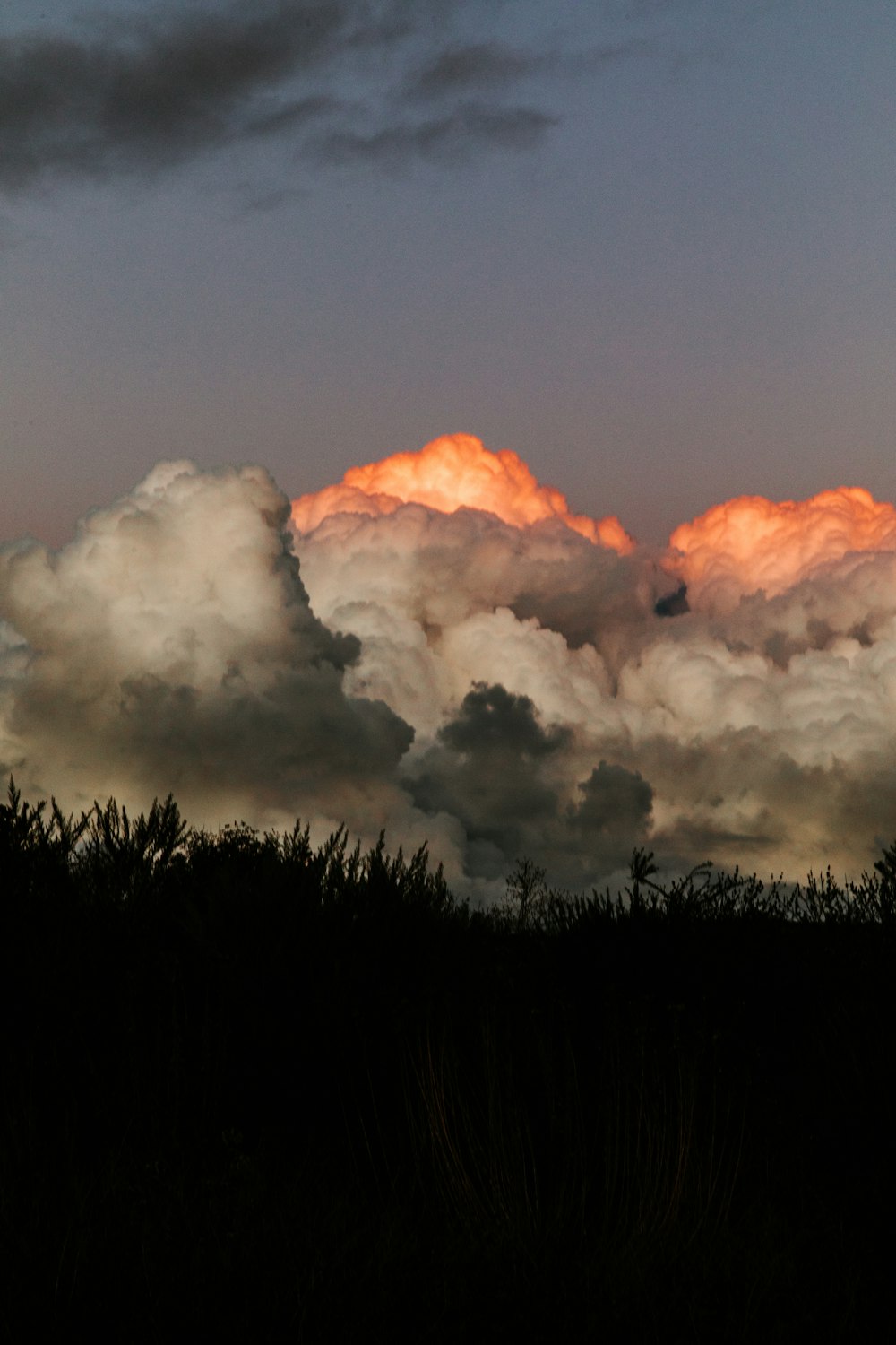 white and orange cloudy sky