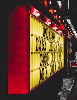 A bright marquee light frame around a video window with a classic Hollywood vibe