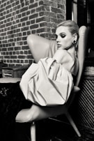 Editorial portrait of a model in a sophisticated setting, embodying luxury and style.