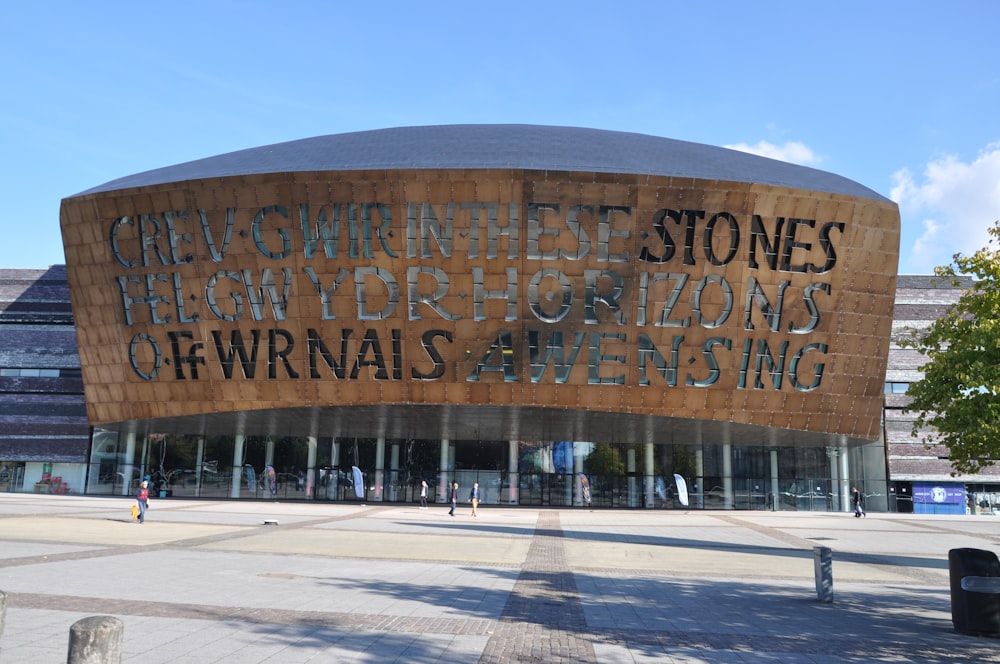 brown concrete building with signage