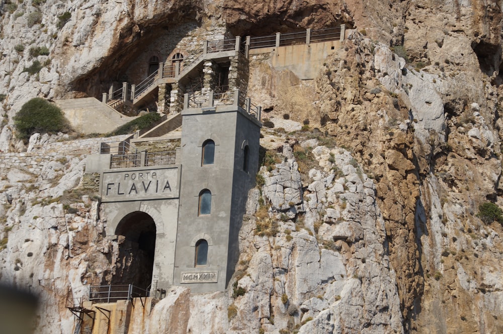 Porp Flavia building on rock at daytime