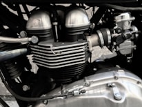 Close-up of a Yamaha motorcycle engine highlighting its craftsmanship.