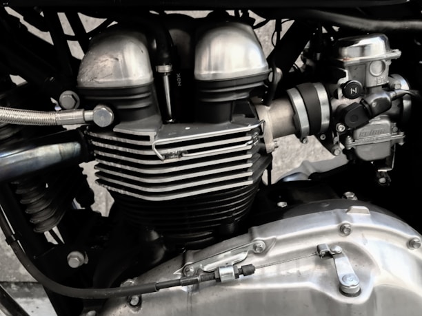 A close-up of a motorcycle engine showcasing intricate details and craftsmanship.
