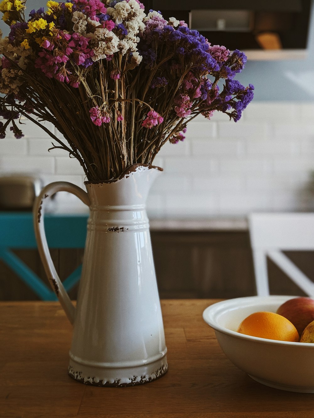 assorted-color flowers in vase