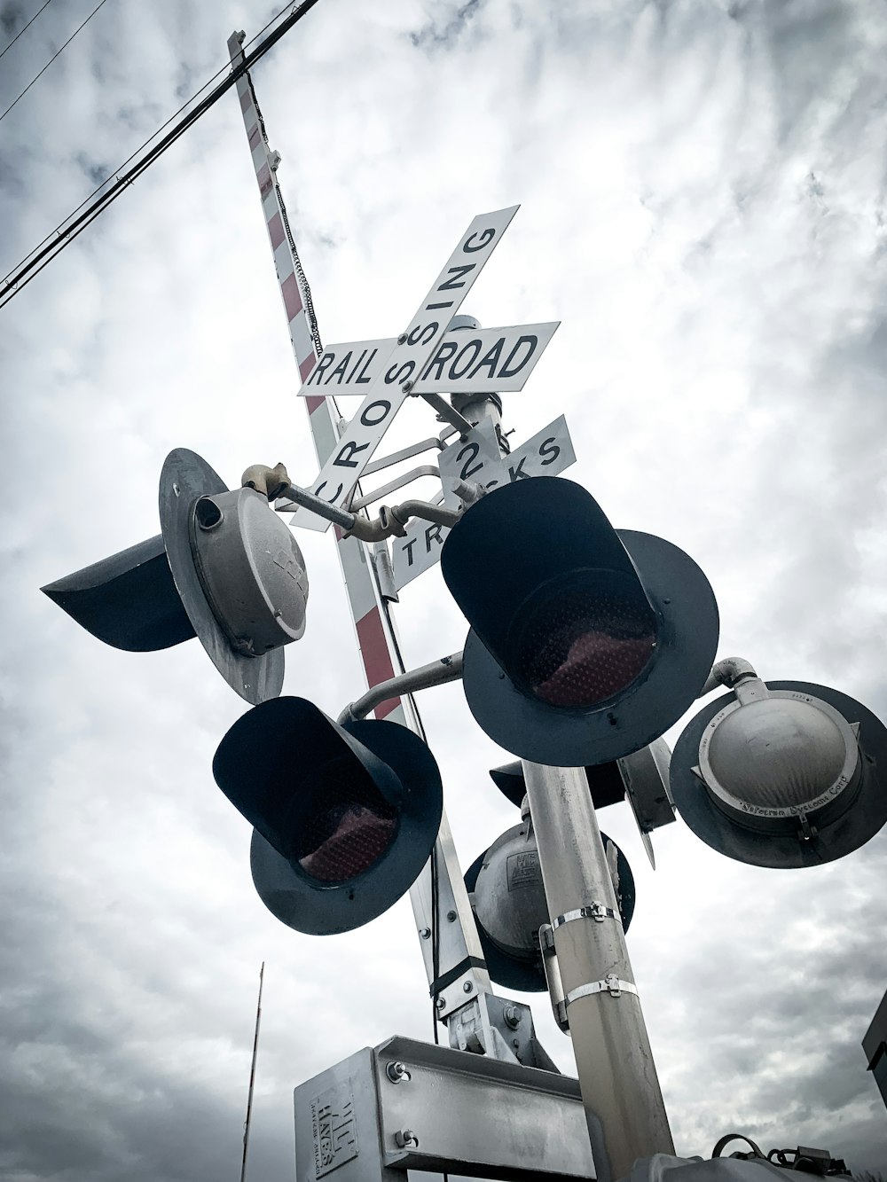 traffic lights under cloudy sky during daytime