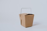 small brown cardboard box with handle