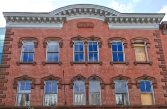 A restored historic brick building with modern windows in Youngstown, Ohio