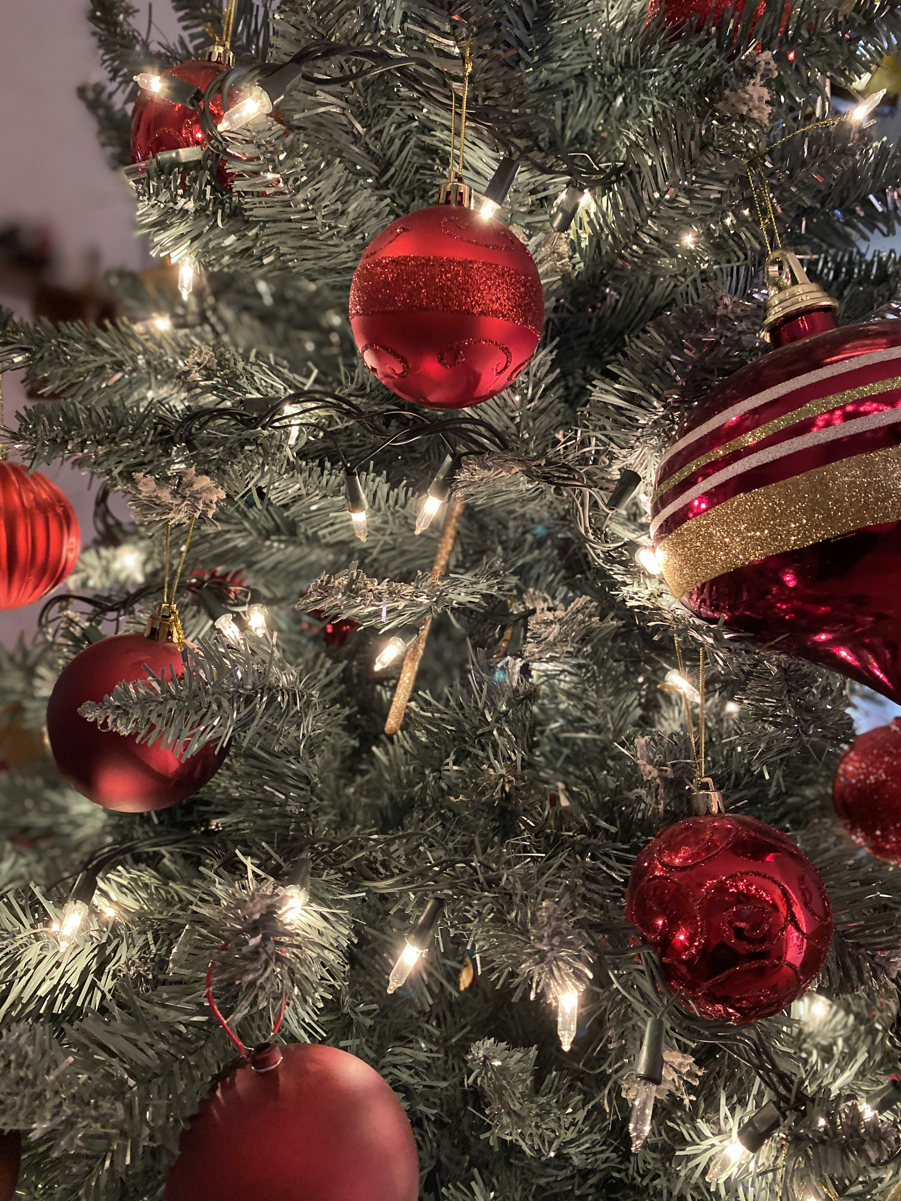 gray Christmas tree and red baubles