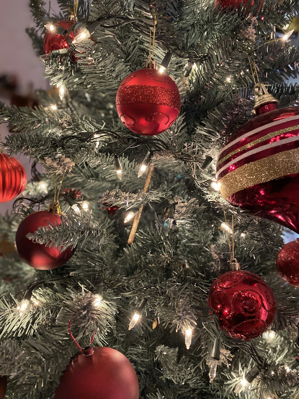 gray Christmas tree and red baubles