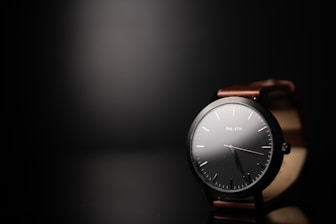 round black analog watch
