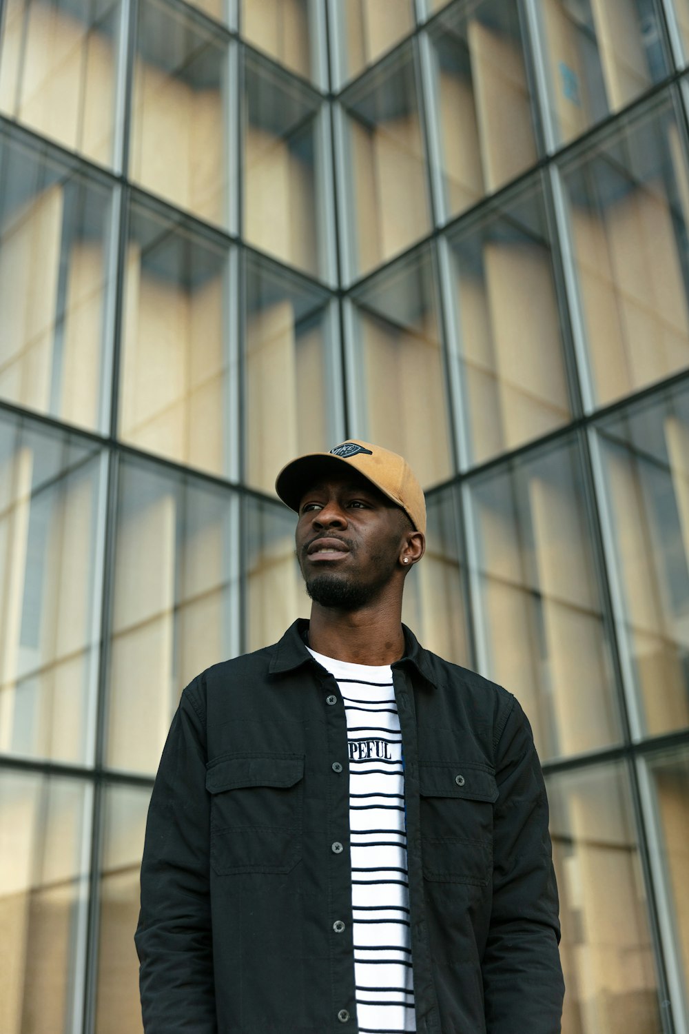 man standing near building