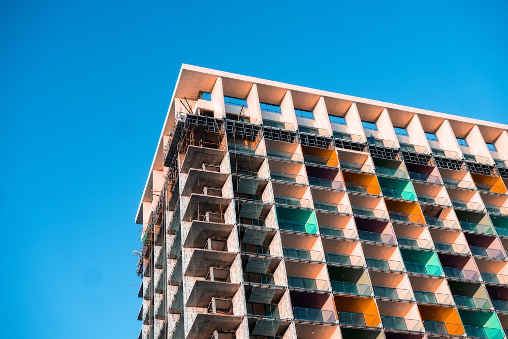 green and beige painted building