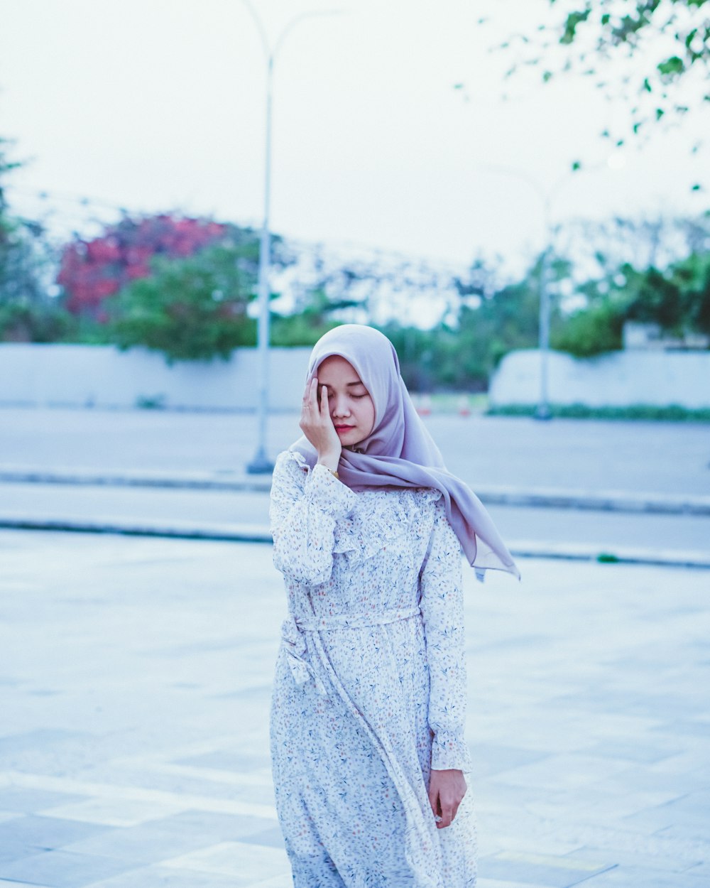 woman wearing pink scarf