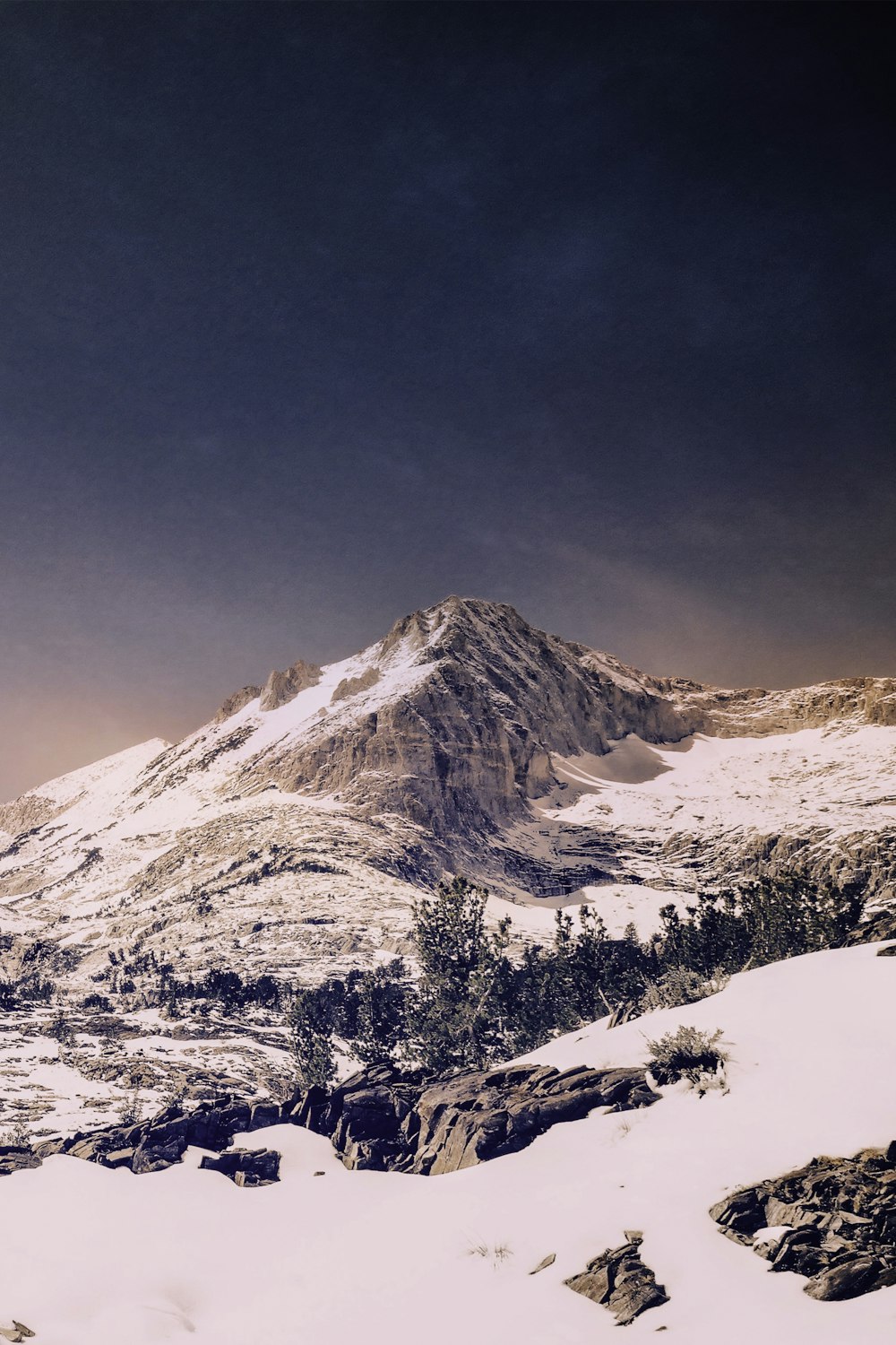 photography of snow-capped mountain range during daytime