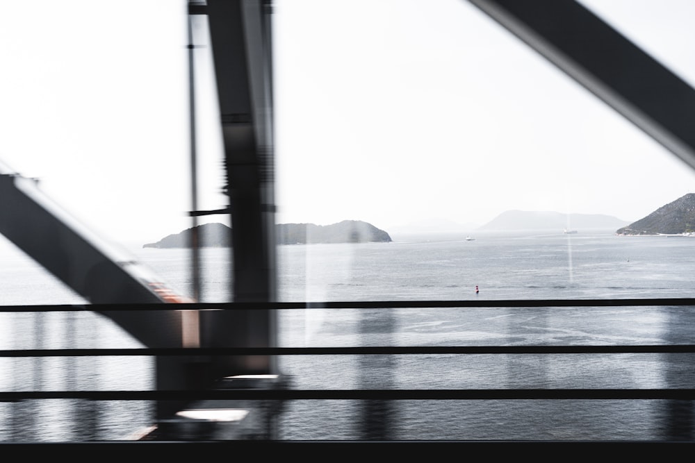 a view of a body of water from a bridge