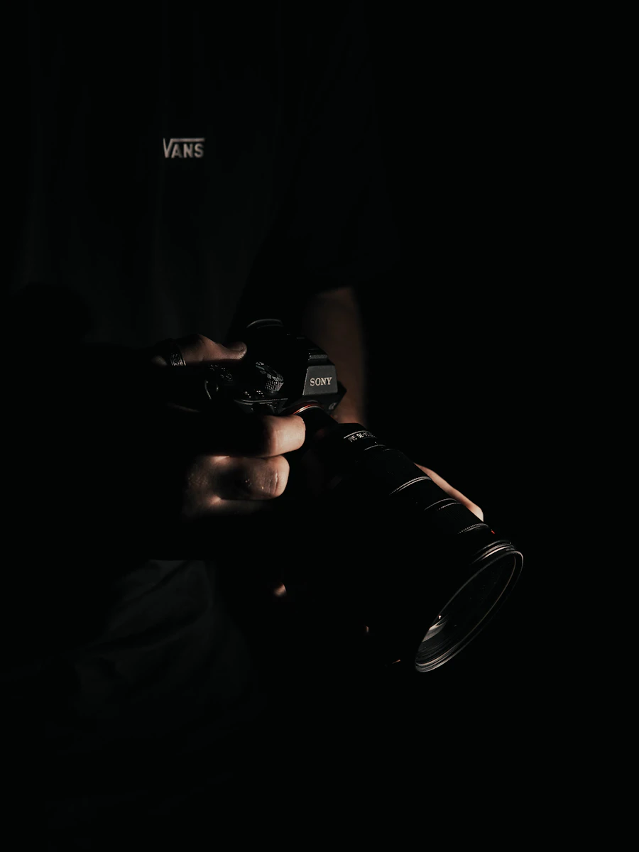 Fotografía: fotógrafo con cámara profesional