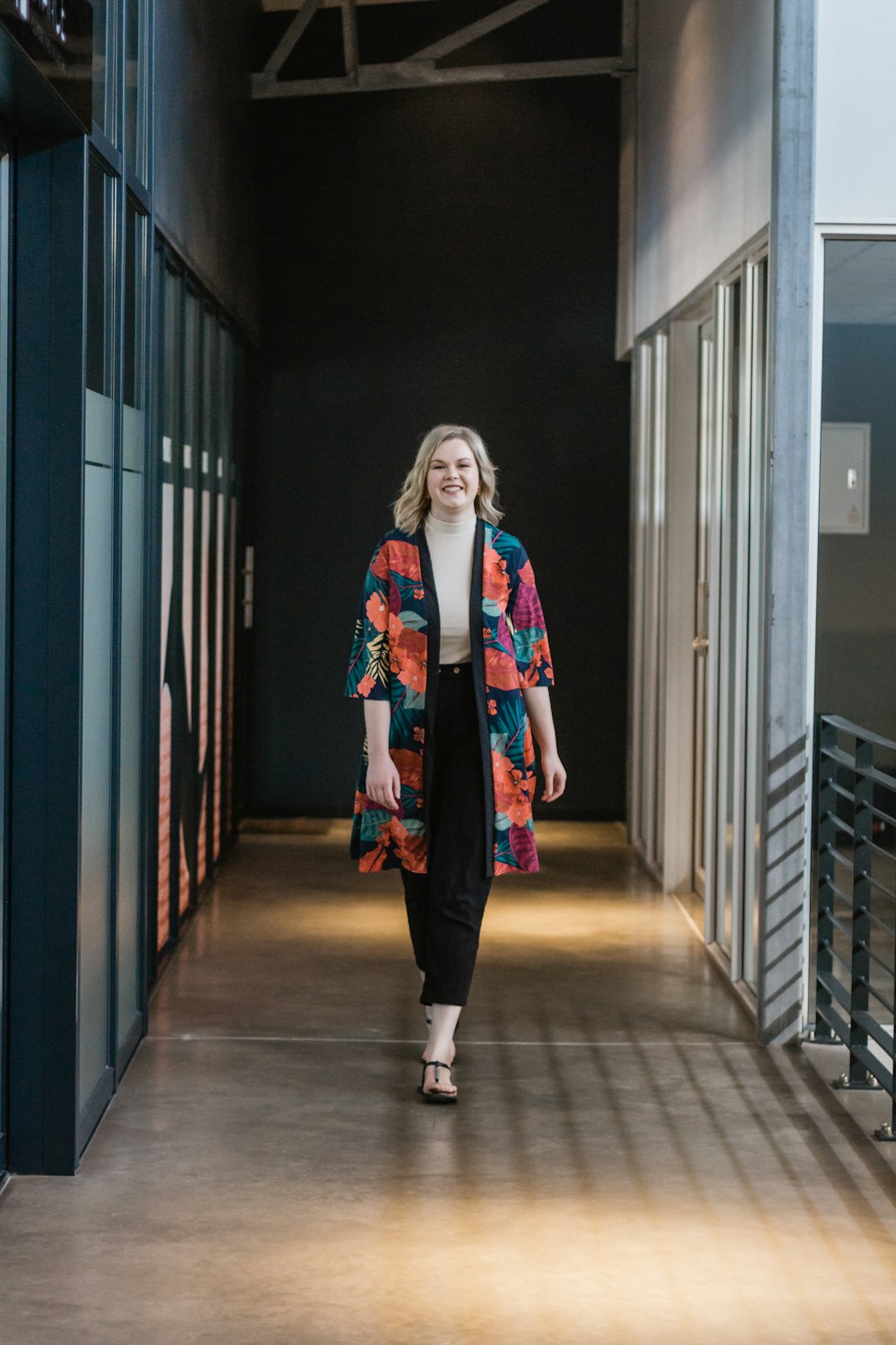 woman walking on hallway