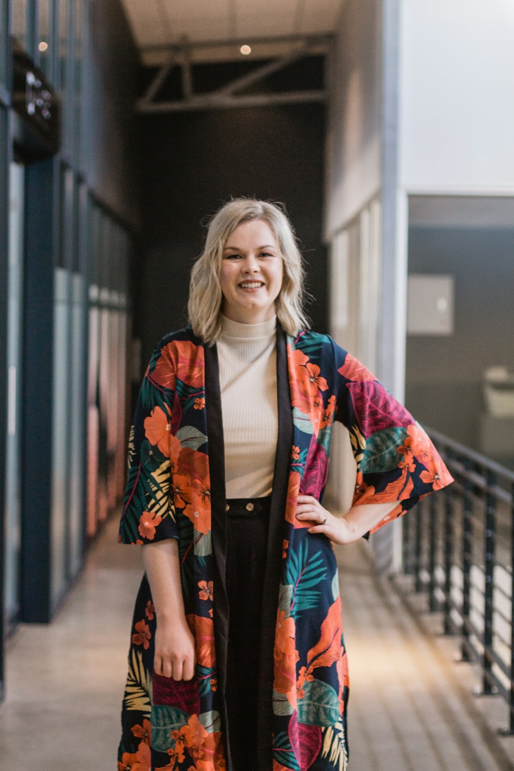 woman in multicolored foliage quarter-sleeved robe