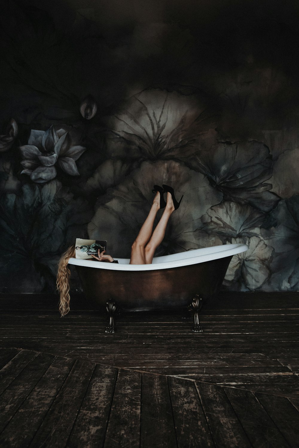 woman lying on bathtube
