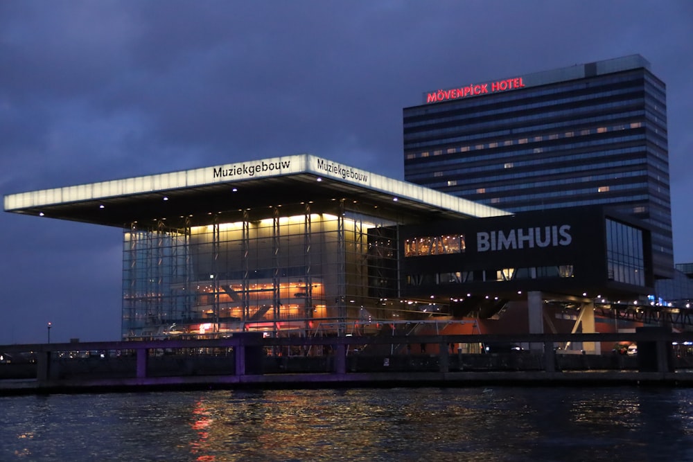 view photography of Bumhuis building near sea