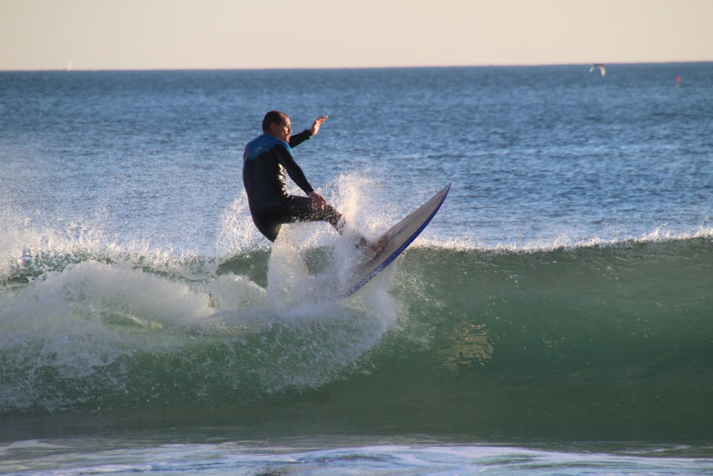 man surfing on water