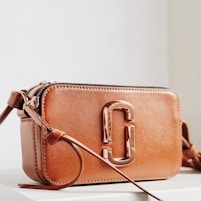 brown leather wristlet