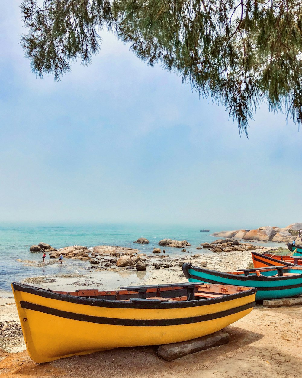 yellow and green boats