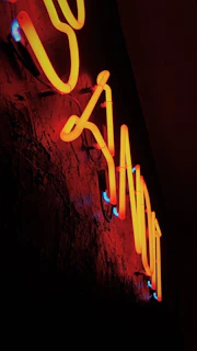 Neon flex lighting creating a warm and inviting glow on a dark background