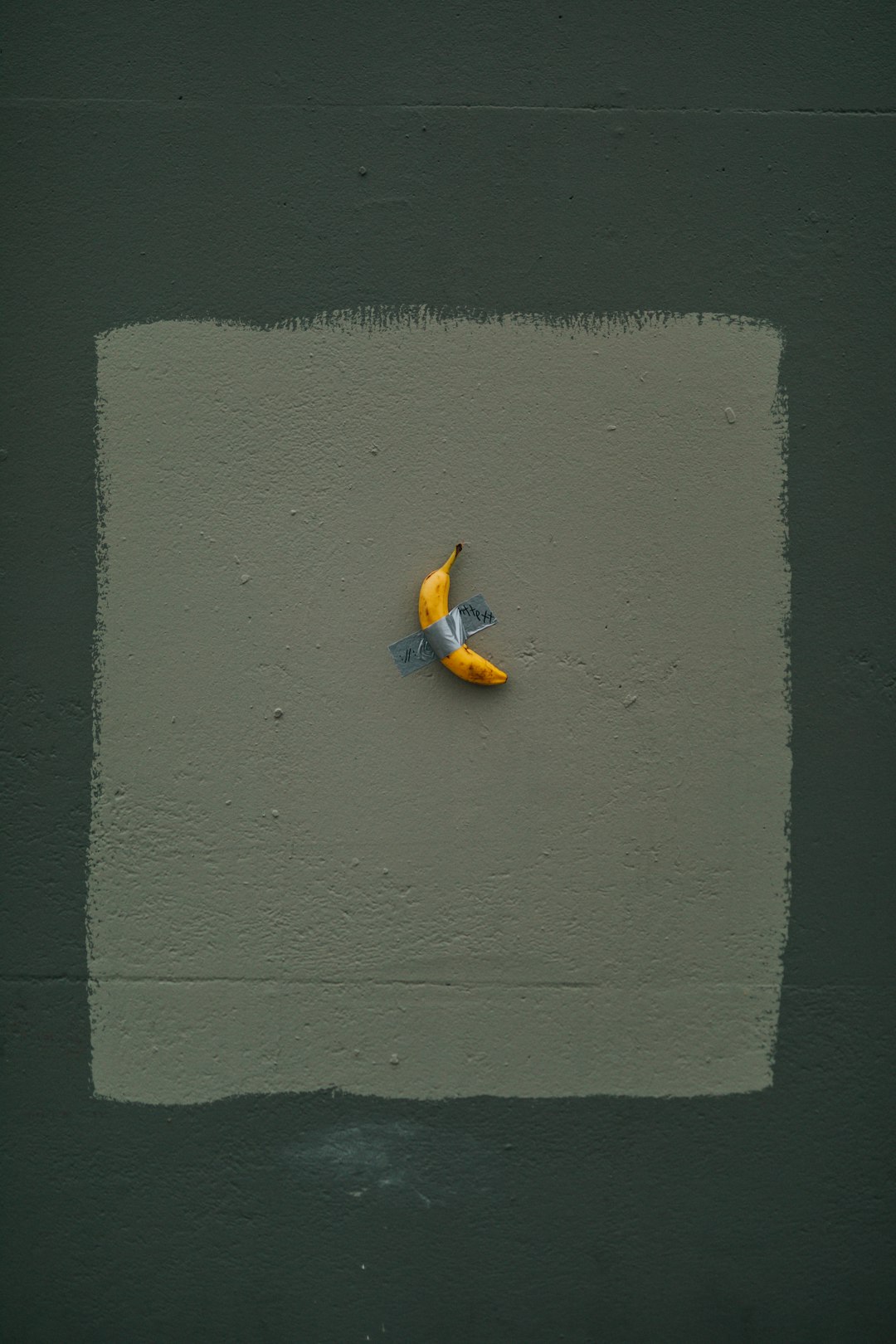 yellow banana fruit with tape