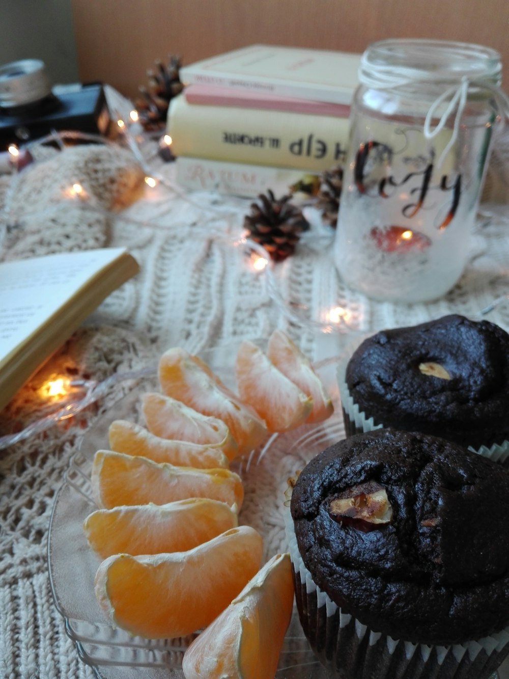 oranges beside baked cupcakes