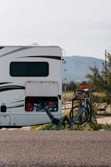 shallow focus photo of white RV trailer