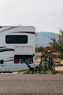 shallow focus photo of white RV trailer