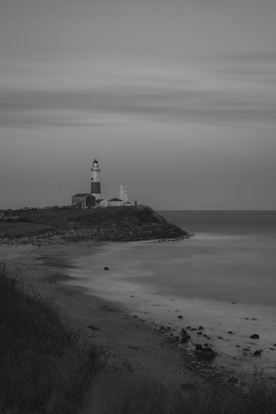 grayscale photography of lighthouse during daytime