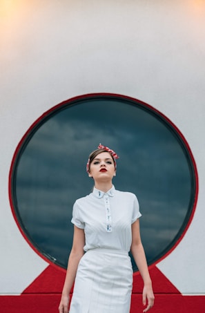 woman wearing white shirt and white skirt